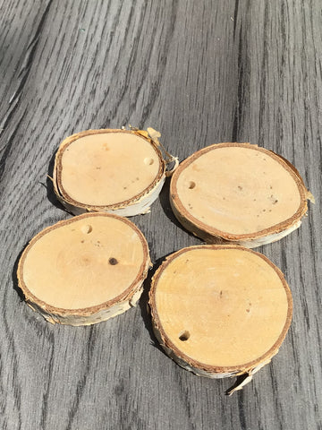 Hanging wooden slices with bark on